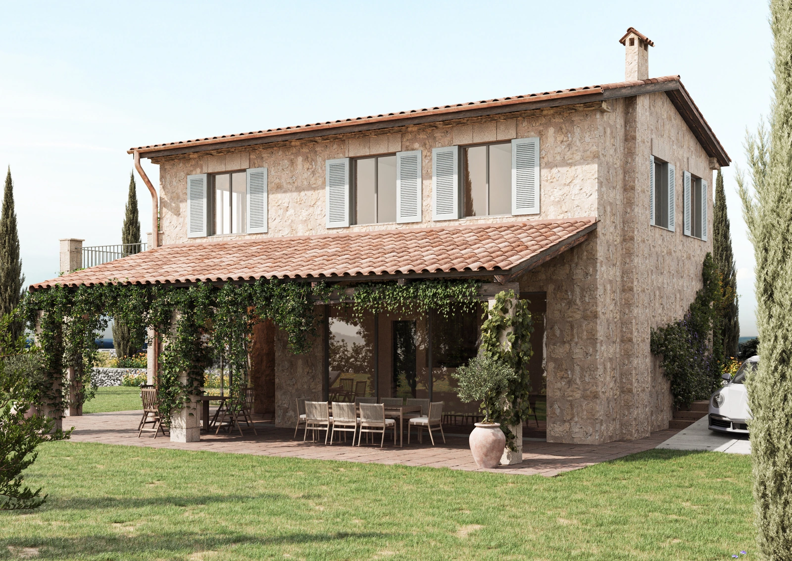A house with a tiled roof, a covered terrace and the mountains behind, project visualisation